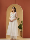 White cotton calm Kurta pant set.